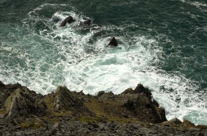 Sea breaks upon the rocky Irish coastline